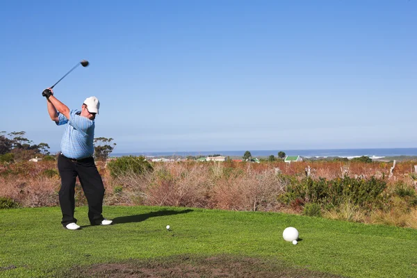 Muž hrající golf. — Stock fotografie