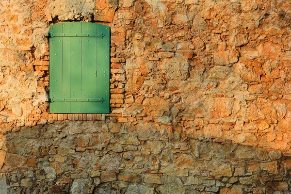 An old locked window in the famous Ile Sainte Marguerite Island Jail, across from Cannes, France — Stock Photo, Image