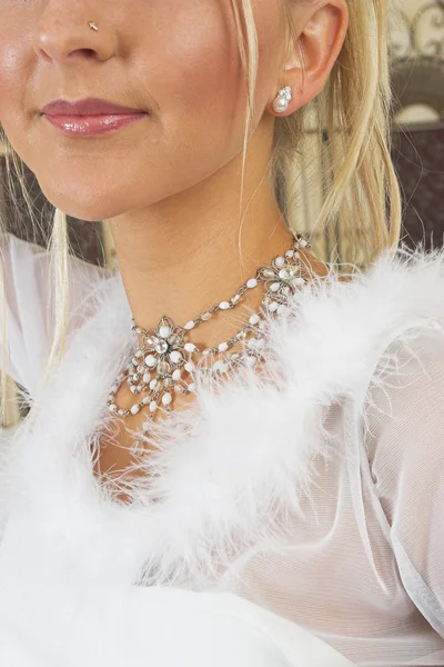Bride in white feathers — Stock Photo, Image