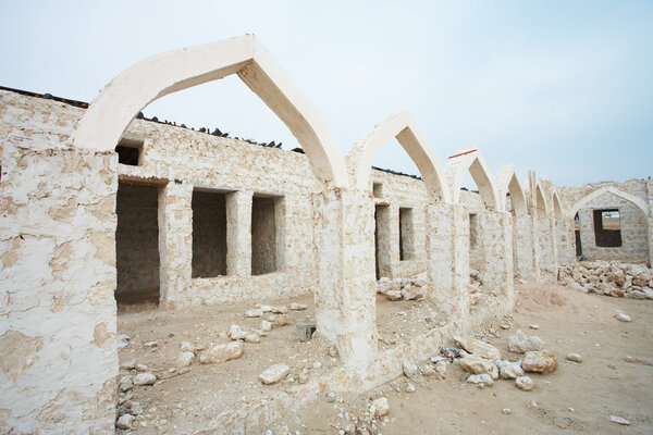 Construction site and empty buildings being constructed in the desert town of Al Wakrah (Al Wakra), Qatar, in the Middle East