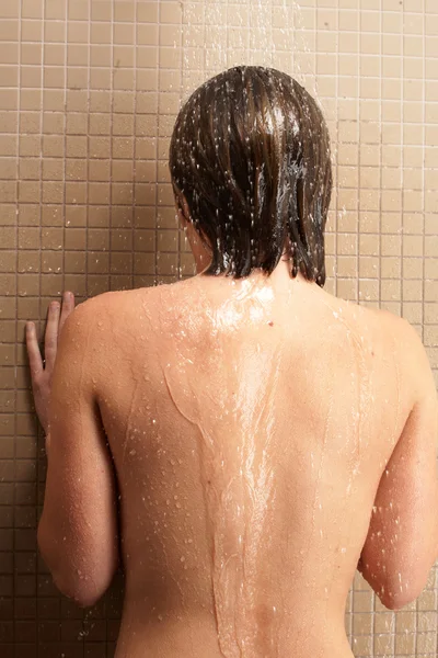 Young caucasian adult woman in shower — Stock Photo, Image