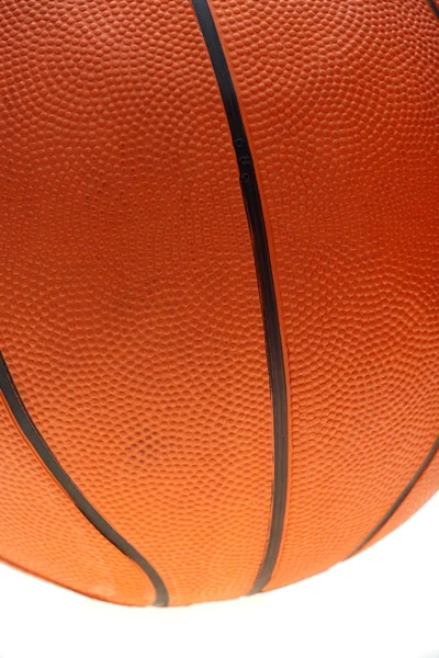 Orange basketball with black lines on a white background — Stock Photo, Image