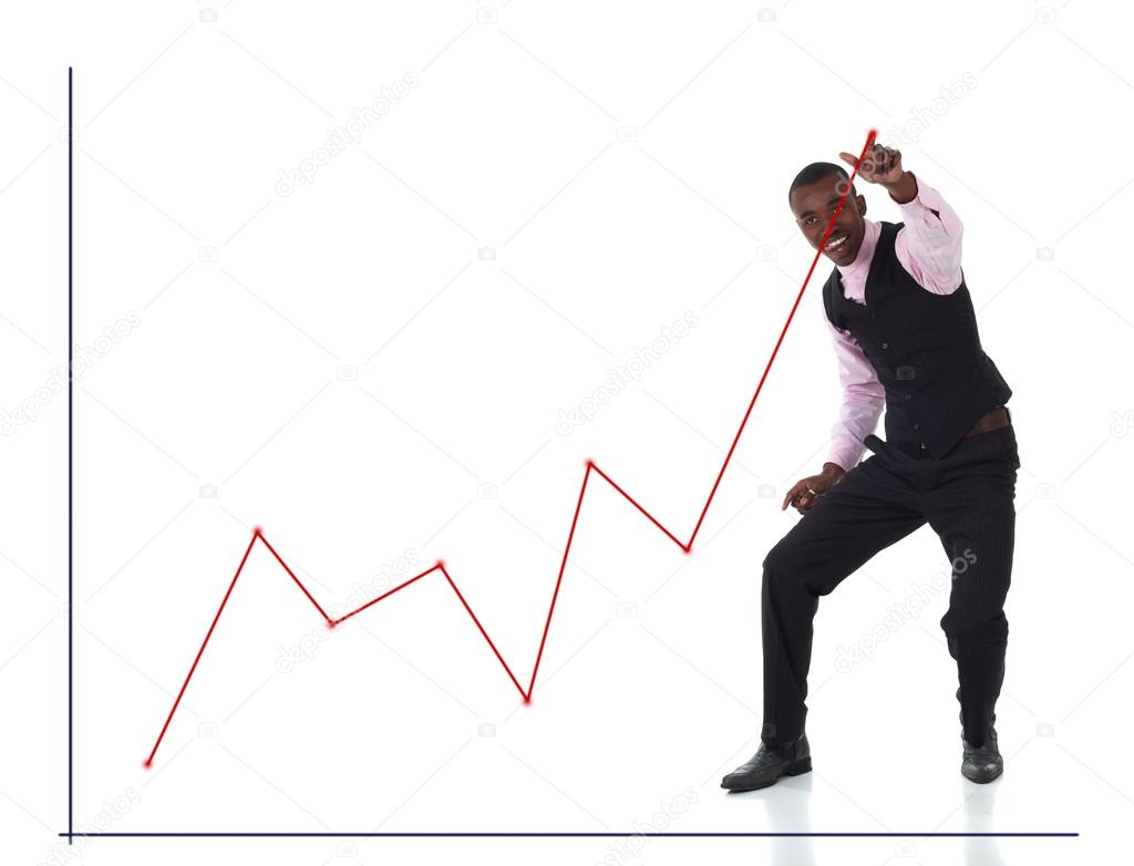 Red graph drawn with his finger by a happy businessman pointing up at the highest point.
