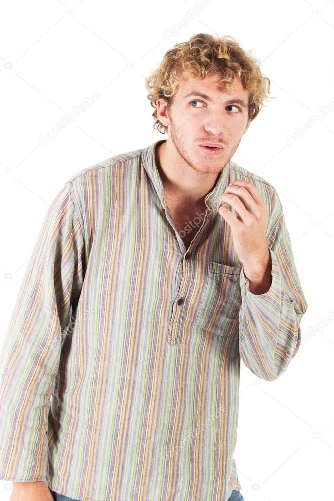 Young blonde adult caucasian man in casual clothes and scruffy beard on a white background.