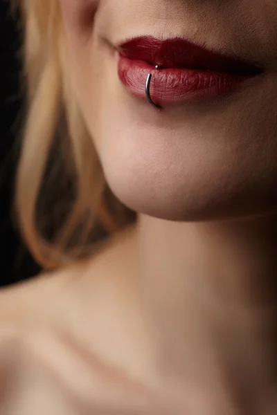 Pierced red lips — Stock Photo, Image