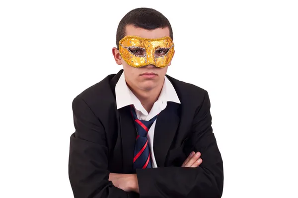 Portrait of a handsome young man wearing a Venetian mask — Stock Photo, Image