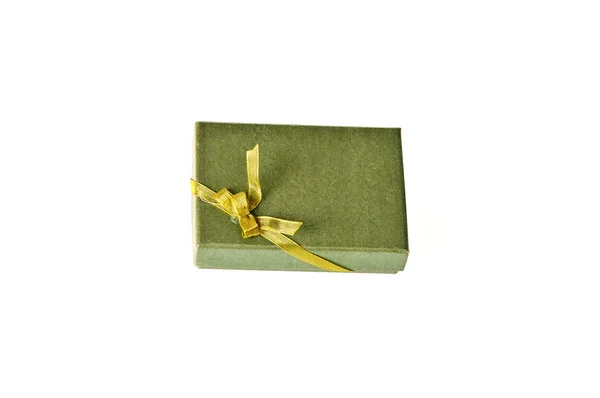 Green gift box with ribbon on white background — Stock Photo, Image