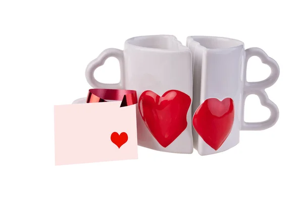 Coffee mugs in shape of hear and card — Stock Photo, Image