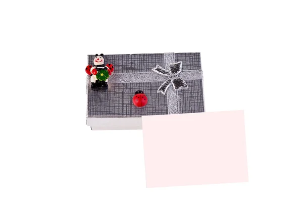 Gift box with ladybugs and pink postcard — Stock Photo, Image