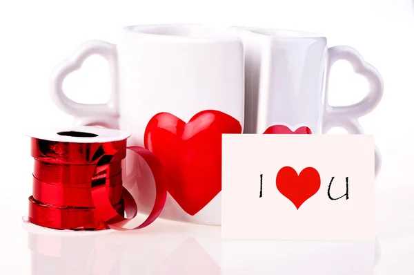 I love you.Coffee mugs in shape of hear and ribbon — Stock Photo, Image