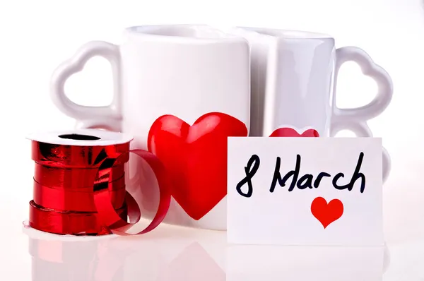 March 8. Coffee mugs in shape of hear whit hearts — Stock Photo, Image