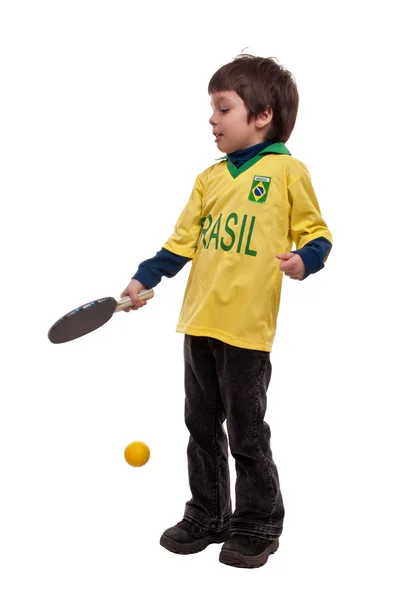Piękny chłopiec bawi się rakieta tenis stołowy i piłka — Zdjęcie stockowe
