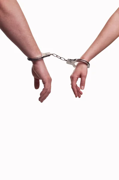 Hands of a man and a woman in handcuffs - relationship concept — Stock Photo, Image