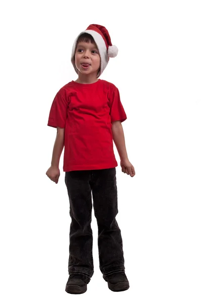 Niño en Santa sombrero pegando lengua aislado sobre fondo blanco —  Fotos de Stock