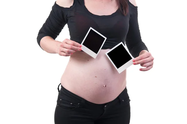 Pregnant woman with Photo paper in hand — Stock Photo, Image