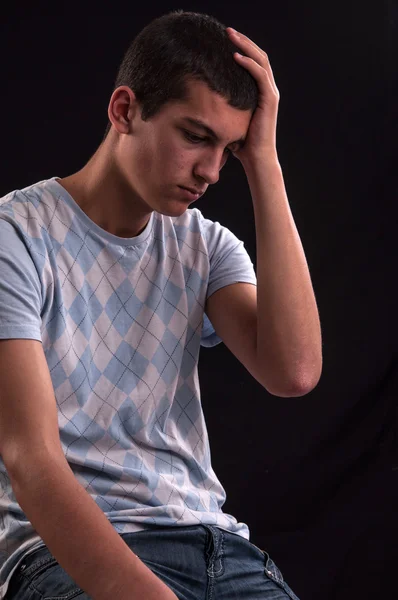 Upset caucasian teen with hand on head — Stock Photo, Image