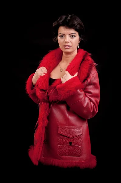 Fashion woman looks away while posing for the camera — Stock Photo, Image