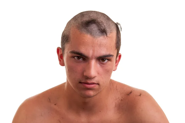 Young man is disappointed that the barber by mistake wrong cut h — Stock Photo, Image