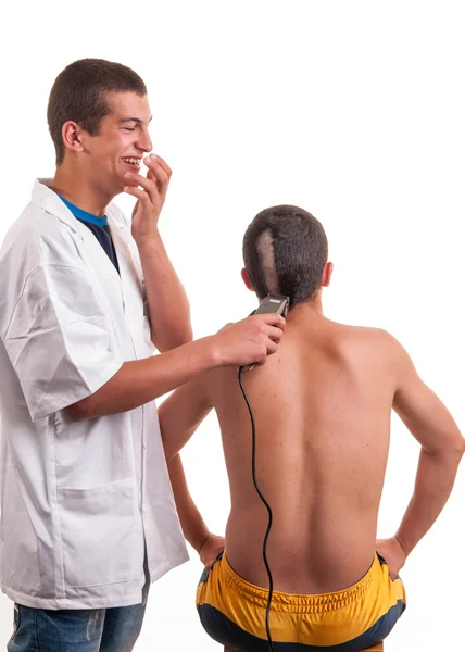 Young barber man laugh that he by mistake wrong cut hair with cl — Stock Photo, Image