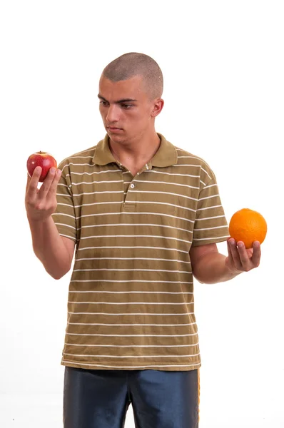 Puzzled young man confused, he doesn't know what to choice betwe — Stock Photo, Image