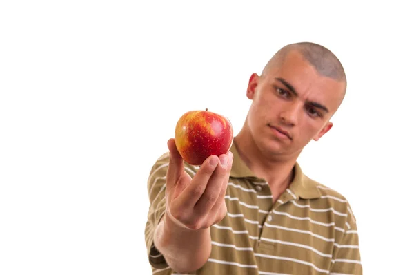 Closeup portrait of a healthy young man holding and offering an — Stock Photo, Image