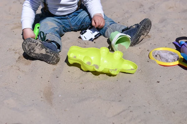 Child on playground in summer park, playing with sand toys — Stock Photo, Image