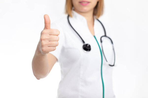 Doctor hand giving thumbs up, isolated on white background