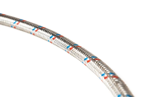 Braided stainless steel water hose on white background — Stock Photo, Image