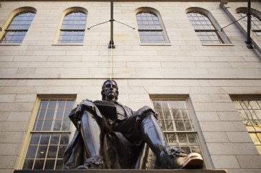 John Harvard statue at Harvard University. clipart