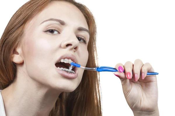 Teeth and braces. The process of cleaning your teeth. Toothbrush Stock Picture