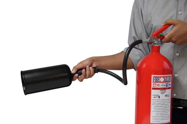 A man showing how to use fire extinguisher isolated over white b — Stock Photo, Image