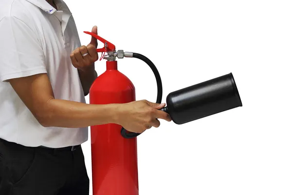 A man showing how to use fire extinguisher isolated over white b — Stock Photo, Image