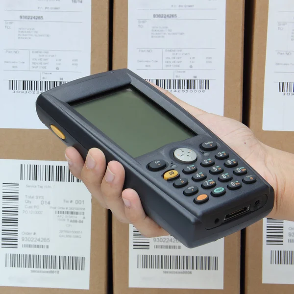 Barcode scanner operated on PocketPC — Stockfoto