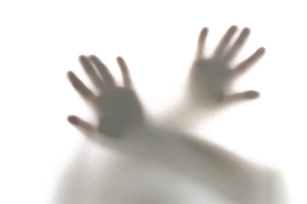 Mystische Silhouette eines Mannes, der um Hilfe bittet lizenzfreie Stockbilder
