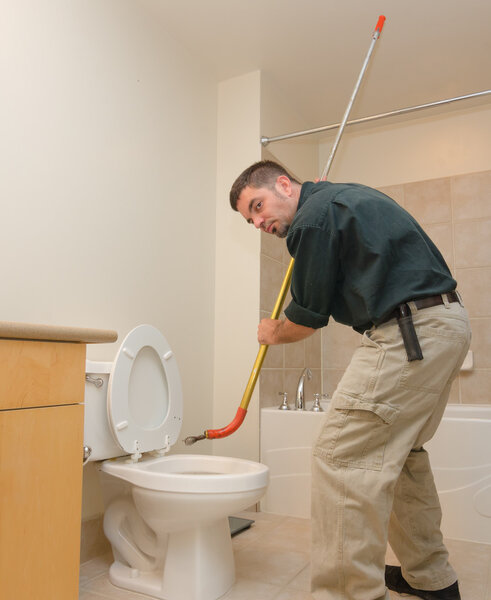 Plumber with auger