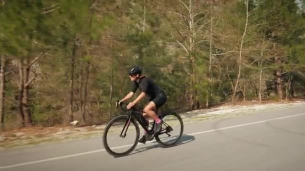 Cycling cardio workout exercising. Cyclist riding bicycle. Woman cycling on bike. Training on bike — Stock Video