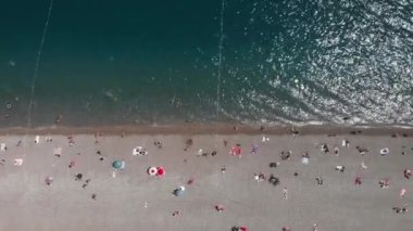 Seashore with sandy beach and turquoise sea water in Antalya, Turkey