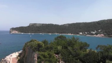 Beautiful lagoon with turquoise water and moored white yachts and sailboats