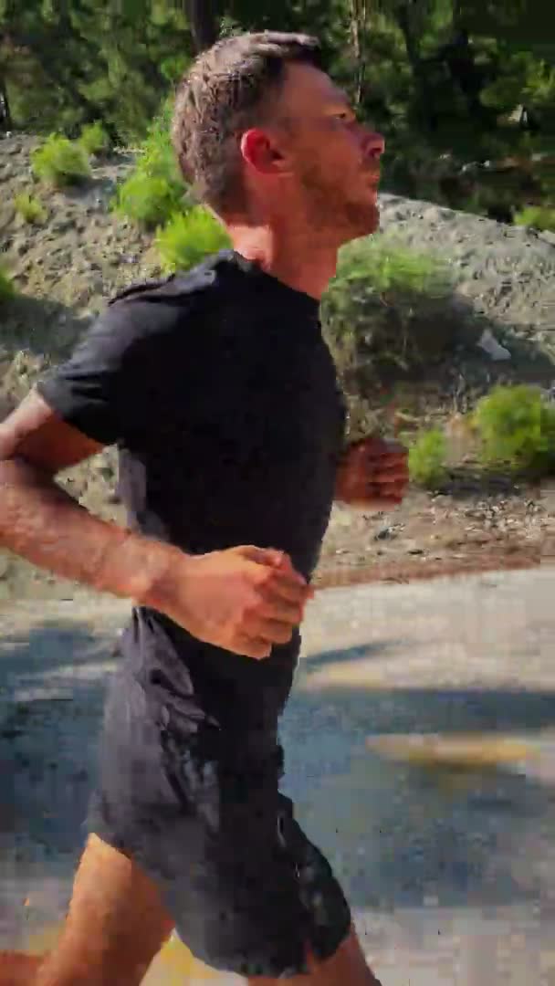 Portrait Running Man Vertical Video Fit Muscular Male Athlete Jogging — Stockvideo