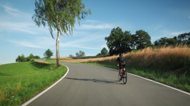 Cycling Triathlon Concept Professional Road Cyclist Riding Bicycle Climbing Uphill — 비디오