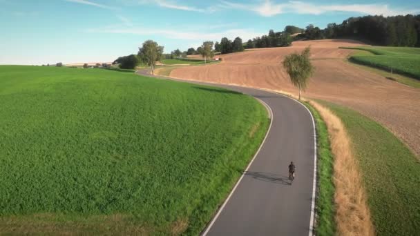 Riding Bicycle Countryside Aerial Drone View Cyclist Cycling Bicycle Uphill — Video Stock