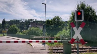 Railway crossing opening. Railway barriers opening on railroad crossing. Transportation and logistic concept