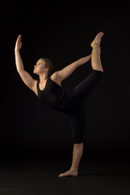 Beautiful, Fit Woman Performing Yoga Posture clipart