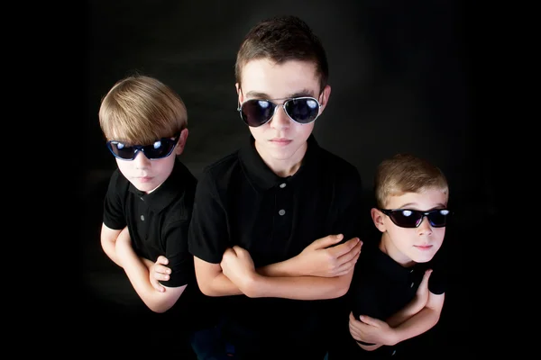 Three Young Men in Black — Stock Photo, Image