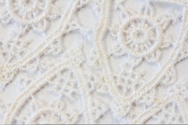 Beyaz bir arka plan üzerinde beyaz dantel