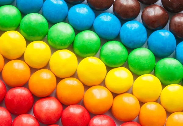 Uma pilha de doces como fundo — Fotografia de Stock