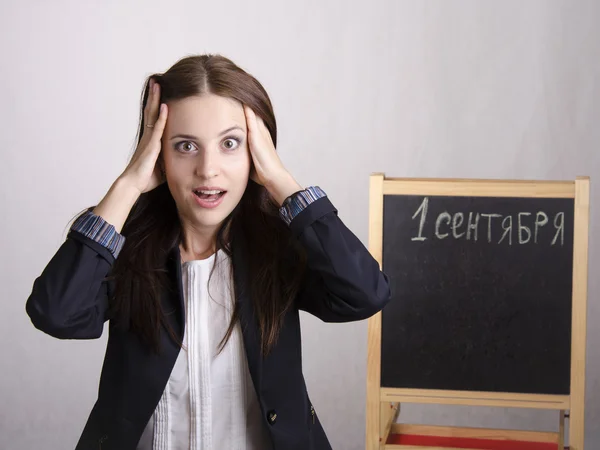 Portrait of a school teacher, who is in shock — Stock Photo, Image