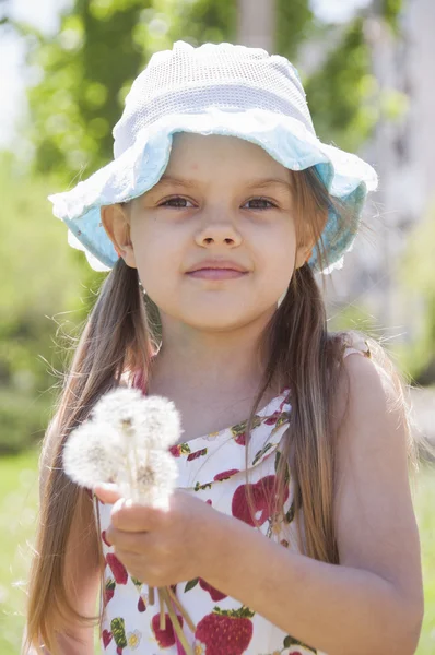 Portrait of a girl with dandelions — Stock Photo, Image