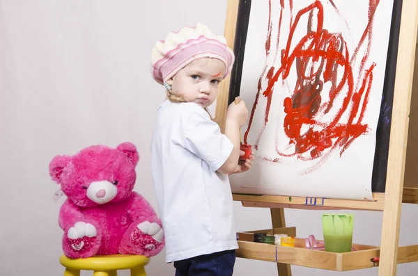 Flicka, konstnären drar på staffli Björn — Stockfoto