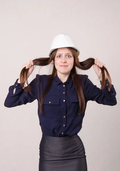 Young girl in shock clutching her hair — Stock Photo, Image